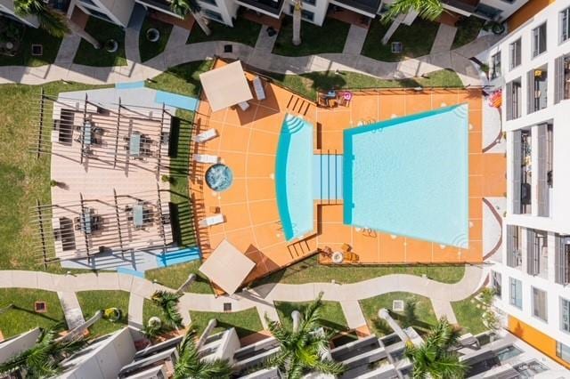 813 Travis St Unit 205, Mission, TX 78572 - drone / aerial view of a pool