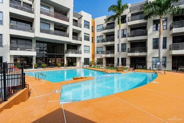 813 Travis St Unit 205, Mission, TX 78572 - view of community pool