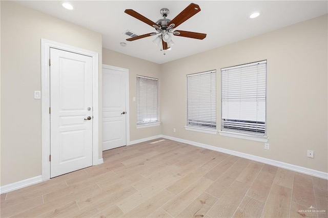 820 Beech Ave Unit 1, Mcallen, TX 78501 - unfurnished bedroom featuring light wood finished floors, baseboards, recessed lighting, and ceiling fan