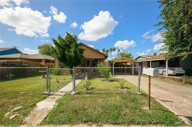 912 W Pierce Ave, Harlingen, TX 78550 - view of yard featuring a gate, a carport, and driveway