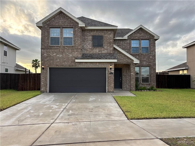 5712 River Rd, Mcallen, TX 78504 - view of front facade featuring brick siding, driveway, a garage, and a shingled roof
