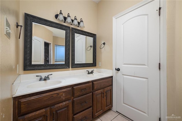 bathroom with tile patterned flooring and vanity