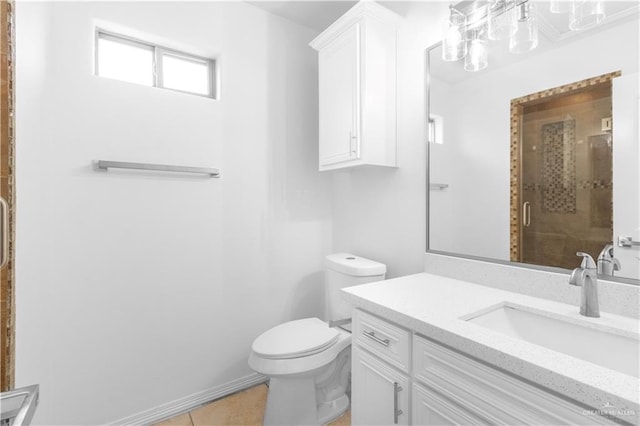 full bath with vanity, toilet, tile patterned floors, and a stall shower