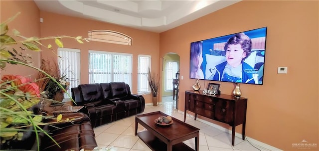 living room with light tile patterned floors