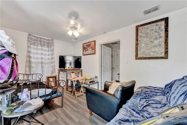 406 S 21st St, Mcallen, TX 78501 - living area featuring wood finished floors and crown molding
