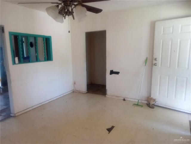 902 S Indiana Ave, Mercedes, TX 78570 - unfurnished room with ceiling fan and baseboards