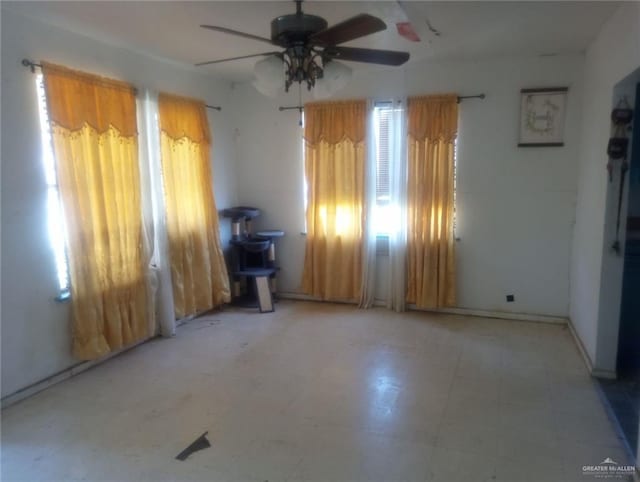 902 S Indiana Ave, Mercedes, TX 78570 - empty room with ceiling fan and light flooring