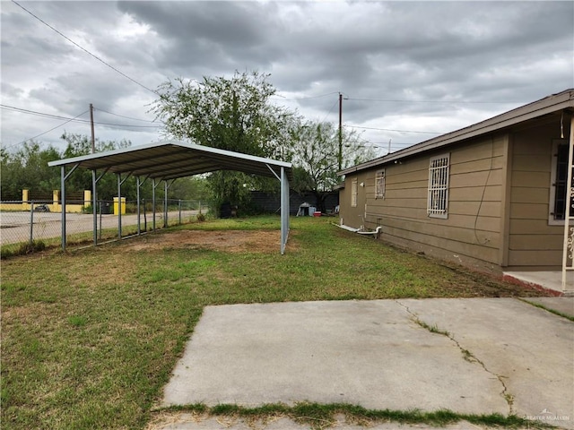 view of yard featuring a carport