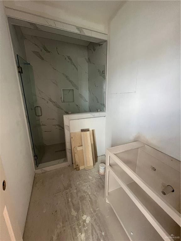 bathroom with an enclosed shower