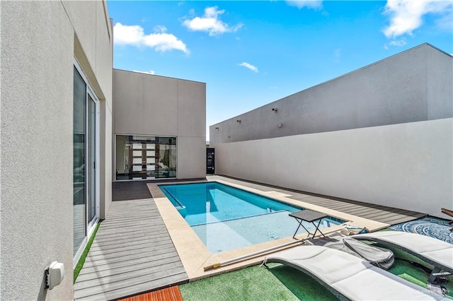 view of pool with a fenced in pool