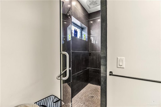 bathroom featuring a stall shower