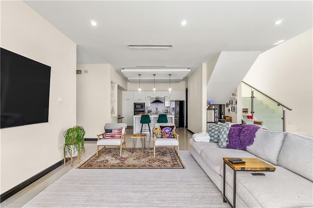 living room with recessed lighting