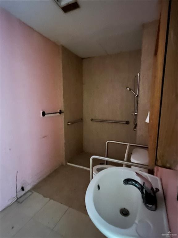 2322 E La Pointe Ave, Alton, TX 78573 - bathroom featuring a sink, walk in shower, and tile patterned flooring