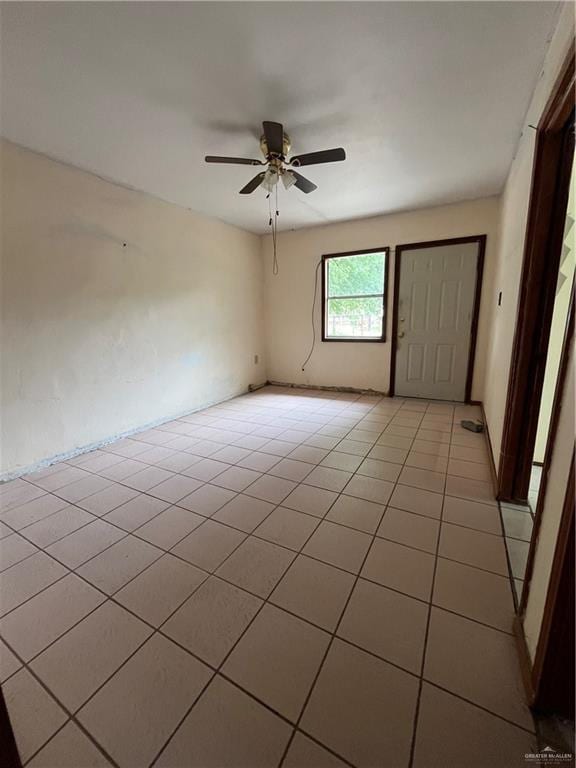 2322 E La Pointe Ave, Alton, TX 78573 - spare room featuring light tile patterned floors and a ceiling fan