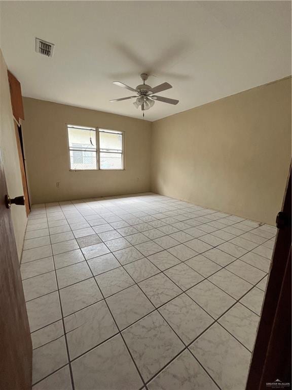 2322 E La Pointe Ave, Alton, TX 78573 - empty room featuring ceiling fan and light tile patterned floors