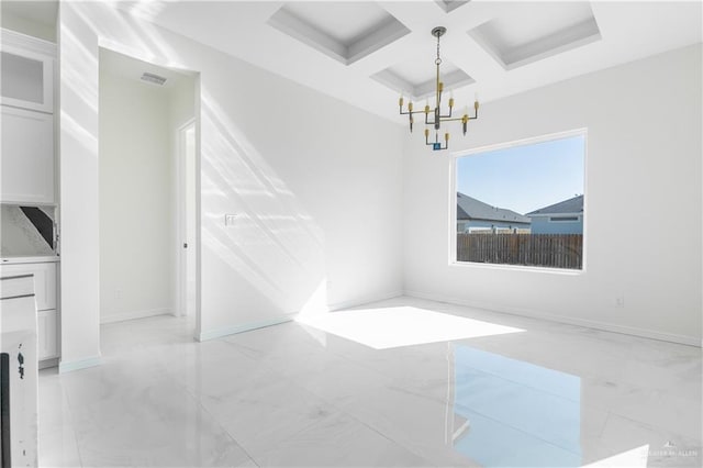 unfurnished dining area featuring beam ceiling, an inviting chandelier, and coffered ceiling