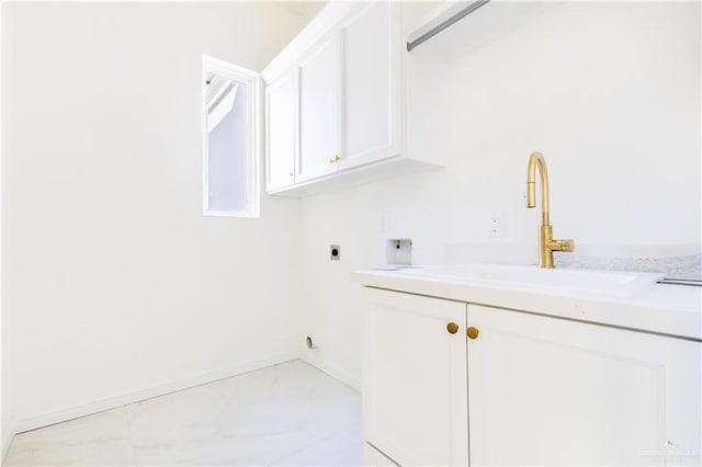 washroom with hookup for an electric dryer, cabinets, sink, and washer hookup