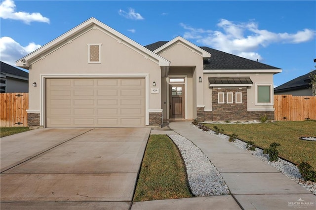 9219 N 25th St, Mcallen, TX 78504 - view of front of house featuring stone siding, fence, and stucco siding