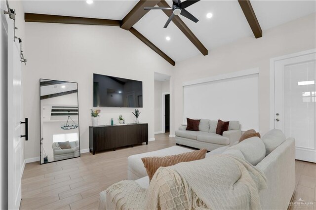 9219 N 25th St, Mcallen, TX 78504 - living room featuring high vaulted ceiling, a barn door, light wood-style flooring, a ceiling fan, and beamed ceiling