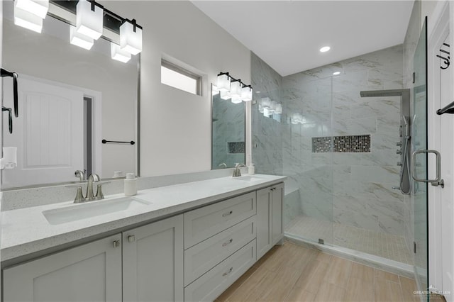 9219 N 25th St, Mcallen, TX 78504 - bathroom featuring recessed lighting, a sink, a marble finish shower, and double vanity