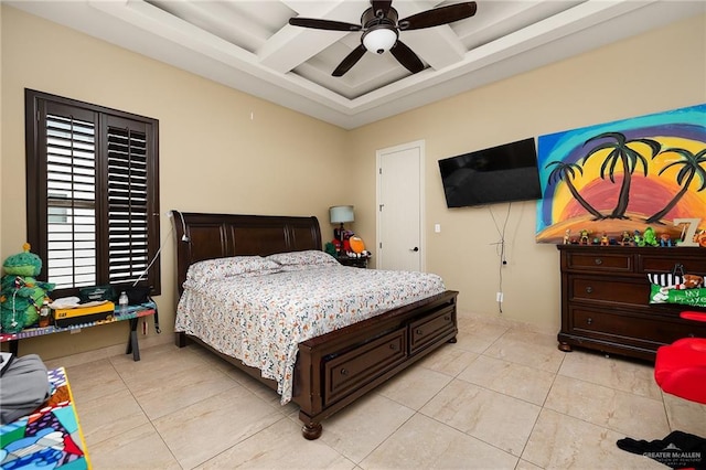 bedroom with beamed ceiling, light tile patterned floors, ceiling fan, and coffered ceiling