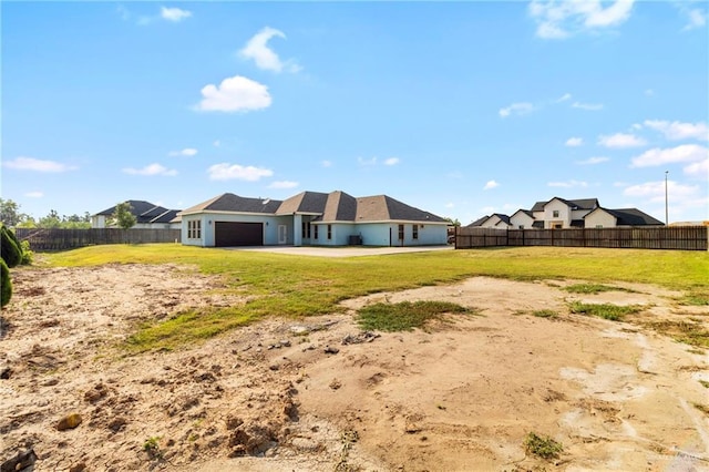 2601 Moreno Sr, Edinburg, TX 78541 - rear view of house with an attached garage