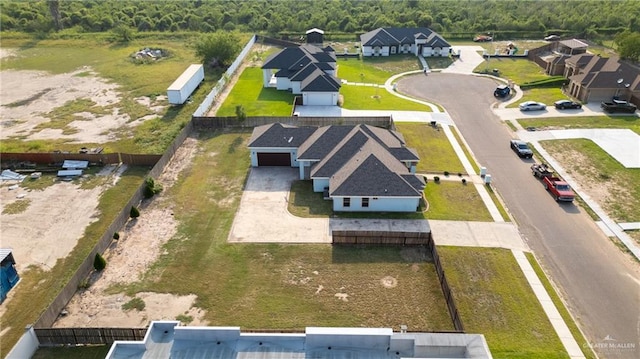 2601 Moreno Sr, Edinburg, TX 78541 - aerial perspective of suburban area featuring a forest