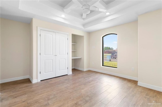 2601 Moreno Sr, Edinburg, TX 78541 - unfurnished bedroom with light wood-style flooring, baseboards, recessed lighting, and a closet