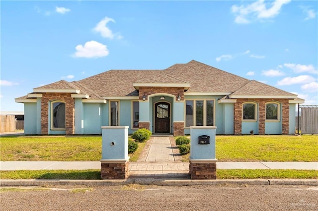 2601 Moreno Sr, Edinburg, TX 78541 - view of front of home with roof with shingles and stucco siding