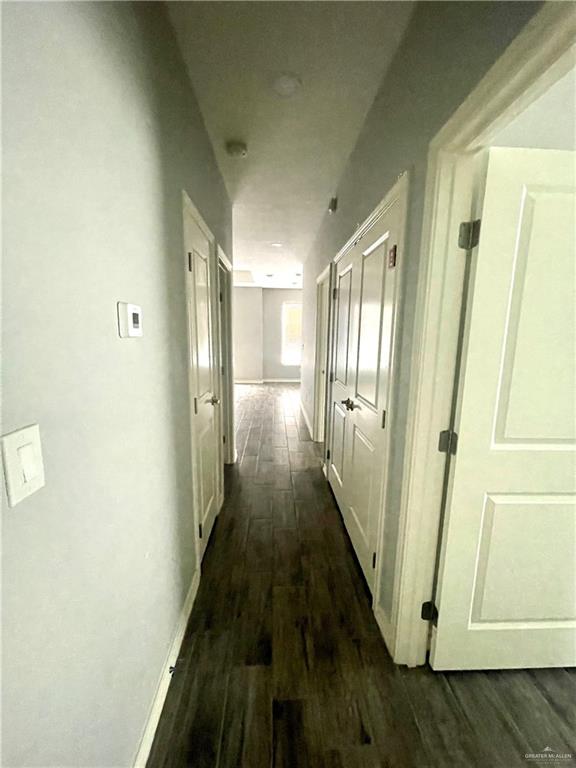 hall featuring dark hardwood / wood-style flooring