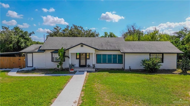 ranch-style house with a front yard