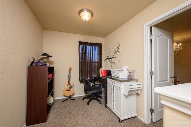 office with light colored carpet and a chandelier