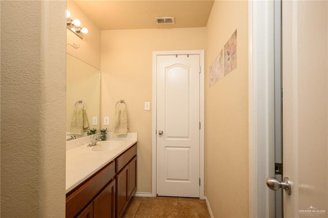 bathroom featuring vanity and tile patterned floors