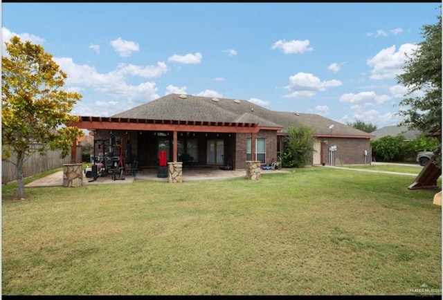 1336 Loretta Lynn Dr, Edinburg, TX 78541 - back of property with a patio area