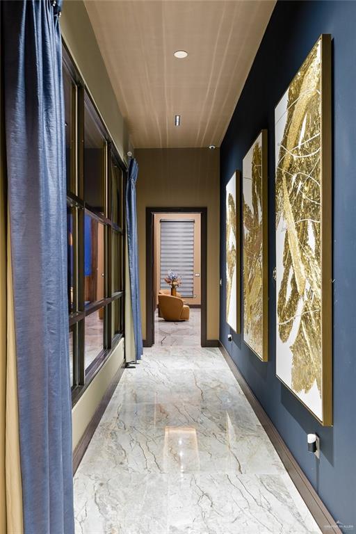 4704 Estancia Pkwy, Mcallen, TX 78504 - hallway with marble tiled flooring and recessed lighting