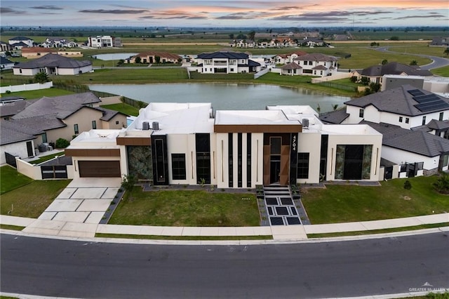4704 Estancia Pkwy, Mcallen, TX 78504 - aerial view at dusk of a water view and a residential view