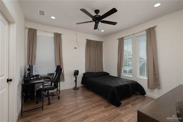 3101 E Iverson Ave, Edinburg, TX 78542 - bedroom with light wood finished floors, baseboards, recessed lighting, a ceiling fan, and an office area
