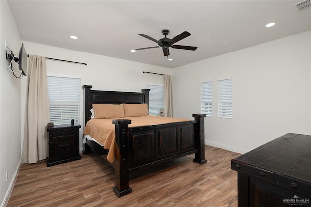 3101 E Iverson Ave, Edinburg, TX 78542 - bedroom with light wood-style flooring, baseboards, recessed lighting, and a ceiling fan
