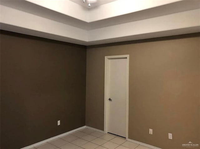 4103 S Veterans Blvd, Edinburg, TX 78542 - unfurnished room with baseboards and light tile patterned floors