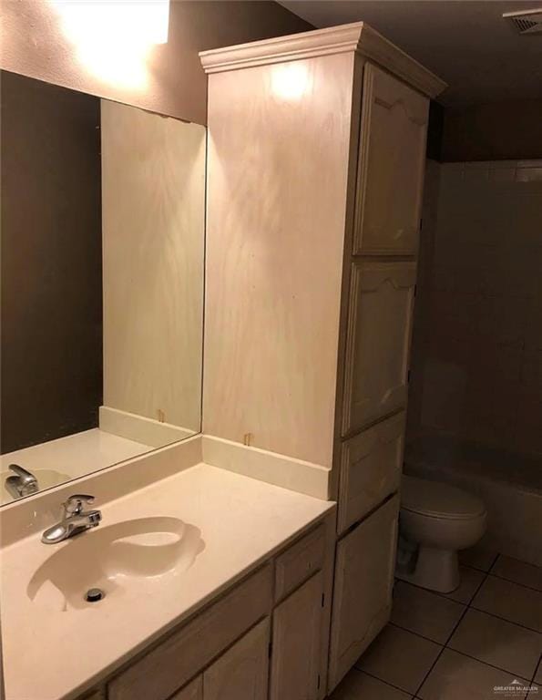 4103 S Veterans Blvd, Edinburg, TX 78542 - full bath featuring tile patterned floors, vanity, and toilet