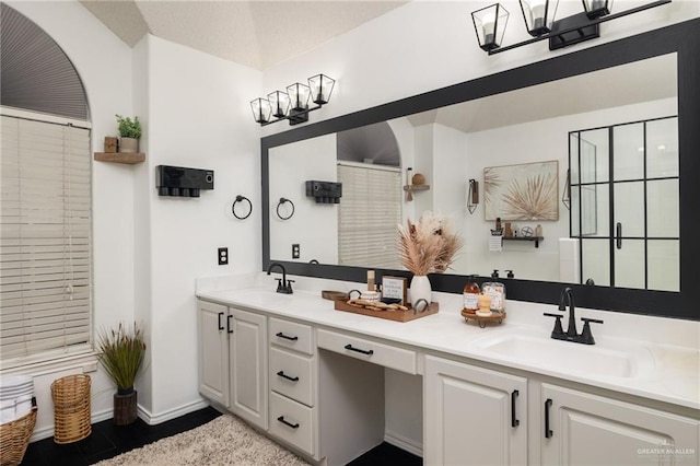 bathroom with tile patterned floors, vanity, and a shower with curtain