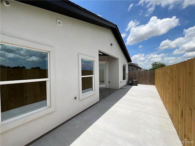 3503 Emma Dr, Weslaco, TX 78596 - view of home's exterior featuring stucco siding and a patio