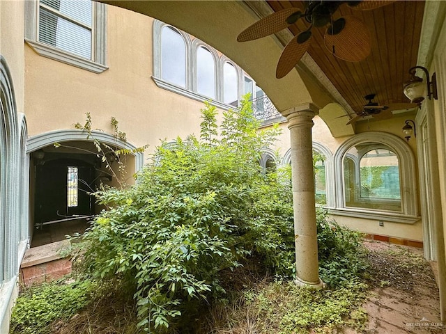 view of patio / terrace featuring ceiling fan