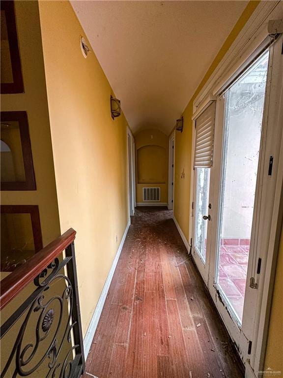 hall with dark wood-type flooring