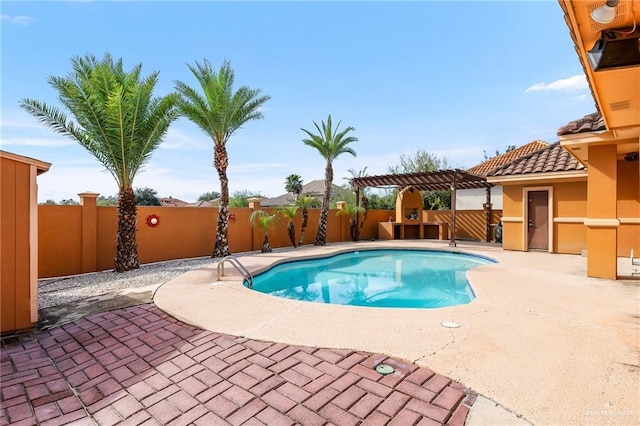 view of pool featuring a patio area and a pergola