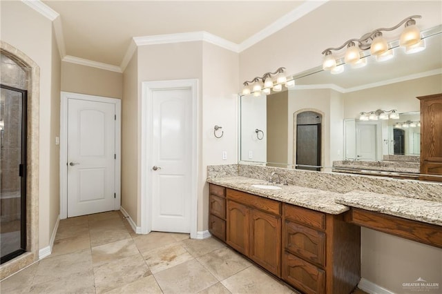 bathroom featuring ornamental molding, vanity, and walk in shower