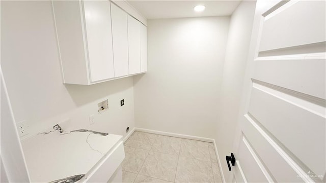 washroom featuring washer hookup, recessed lighting, cabinet space, hookup for an electric dryer, and baseboards