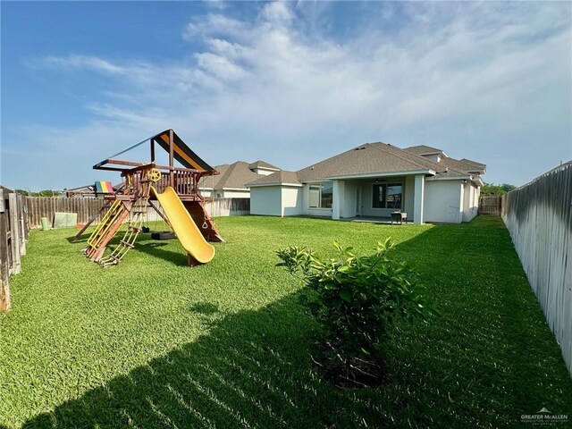 5016 Kendlewood Ave, Mcallen, TX 78501 - view of yard featuring a playground