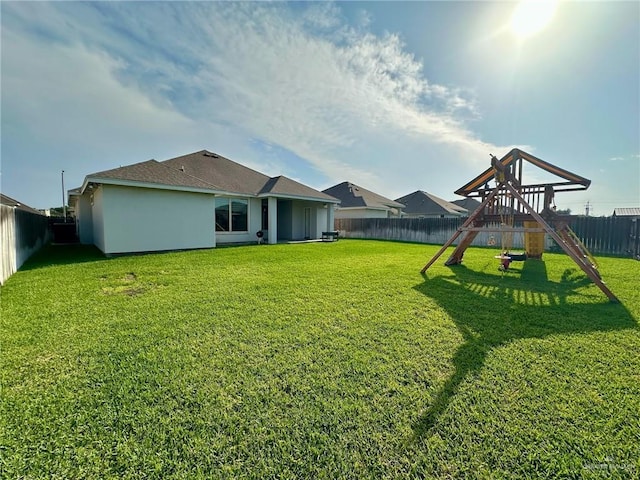 5016 Kendlewood Ave, Mcallen, TX 78501 - view of yard featuring a playground