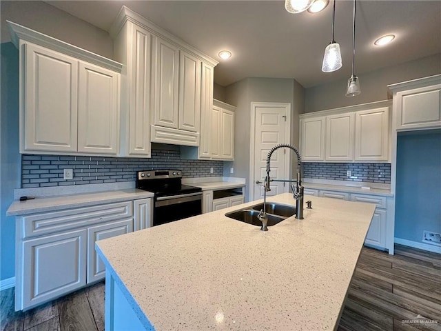 5016 Kendlewood Ave, Mcallen, TX 78501 - kitchen featuring stainless steel electric stove, a sink, a kitchen island with sink, white cabinetry, and tasteful backsplash